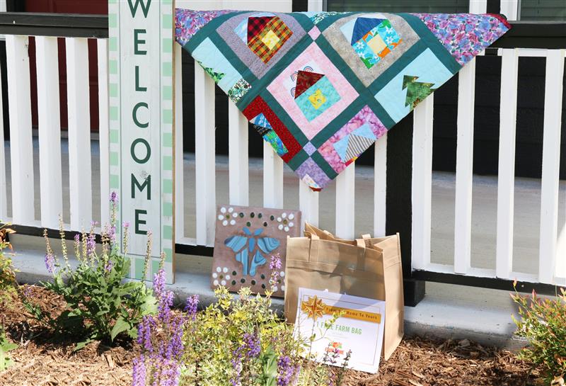 blanket , welcome home sign and Tulsa Master Gardeners , 
